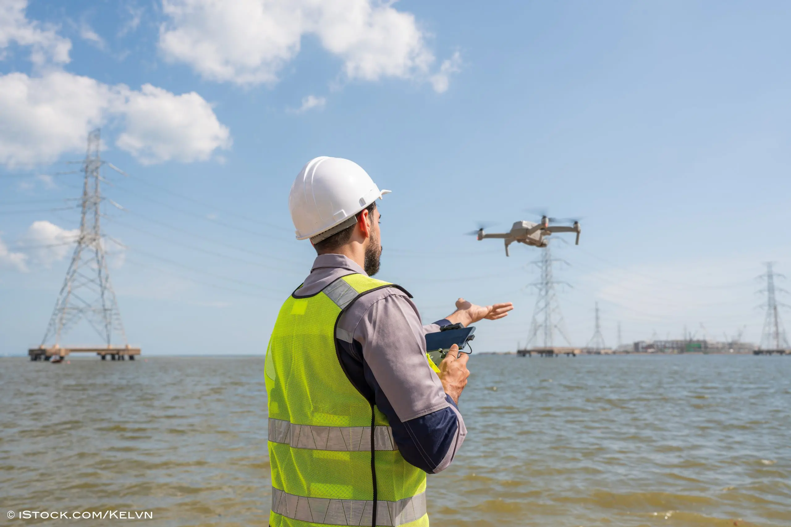 Engineer Specialists Pilot Drone on Construction Site.