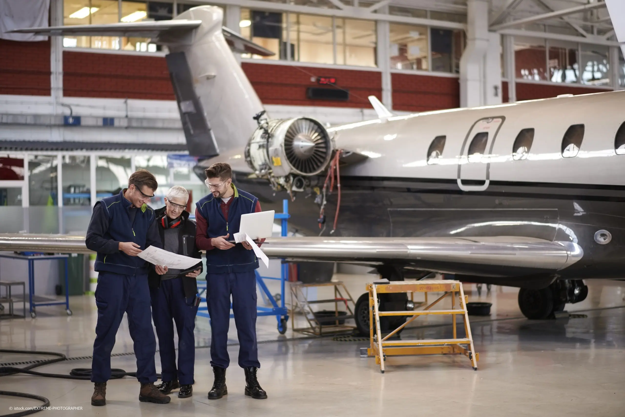 Aircraft mechanics in the hangar