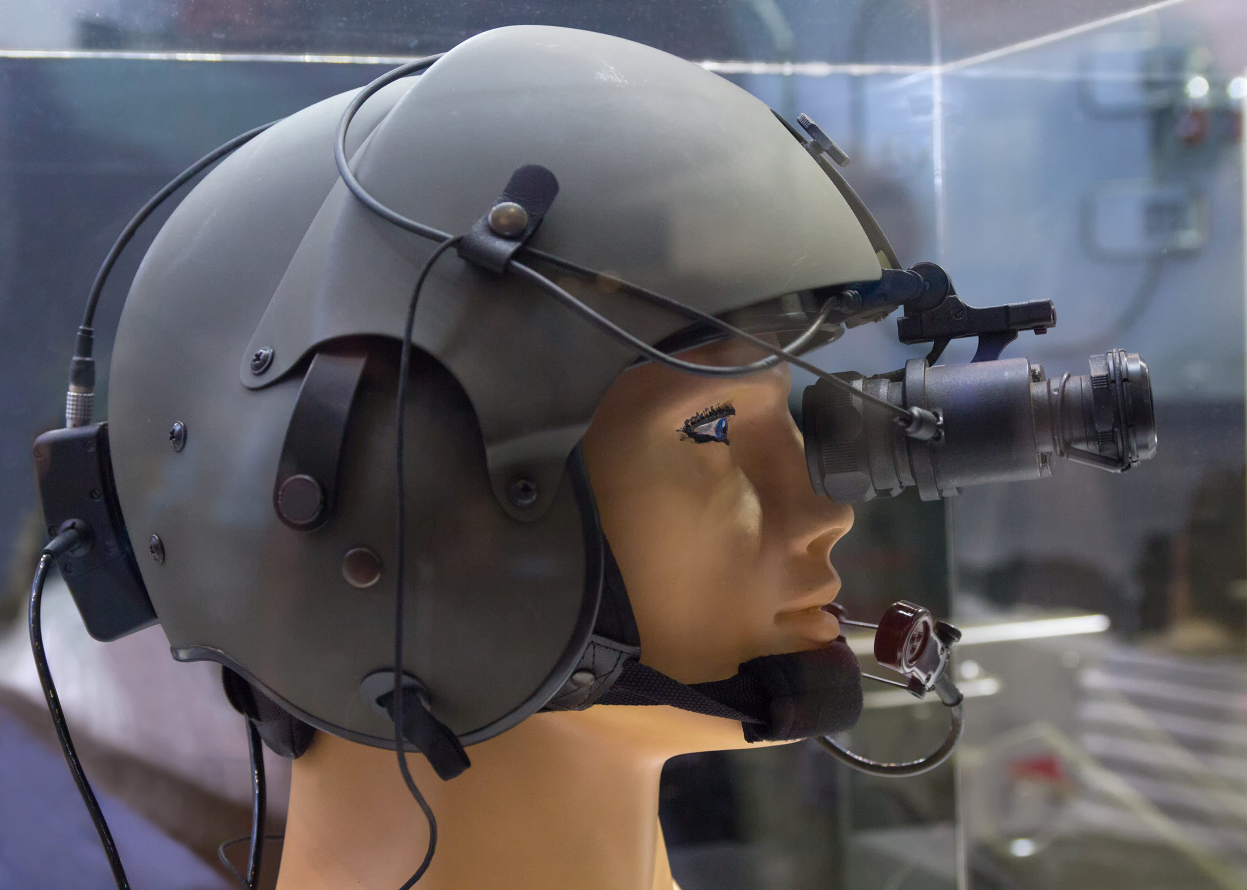 Helmet with night vision device on the demonstration mannequin.